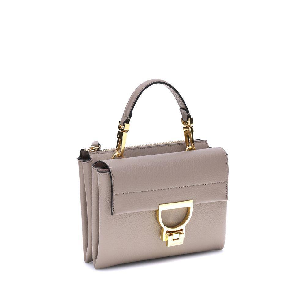 Front view with bag zipped and handles upright.