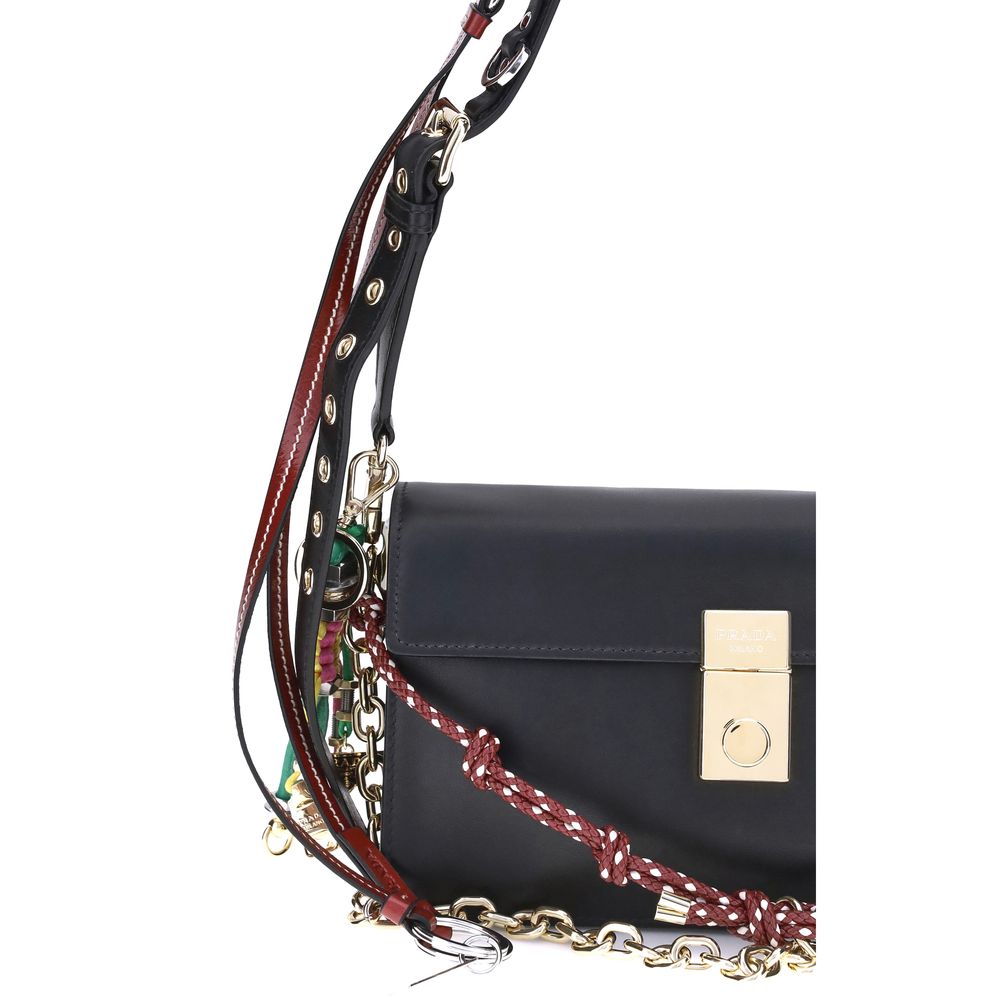 Prada Black Calf Leather Bos Taurus Shoulder Bag with gold accents and decorative chain.