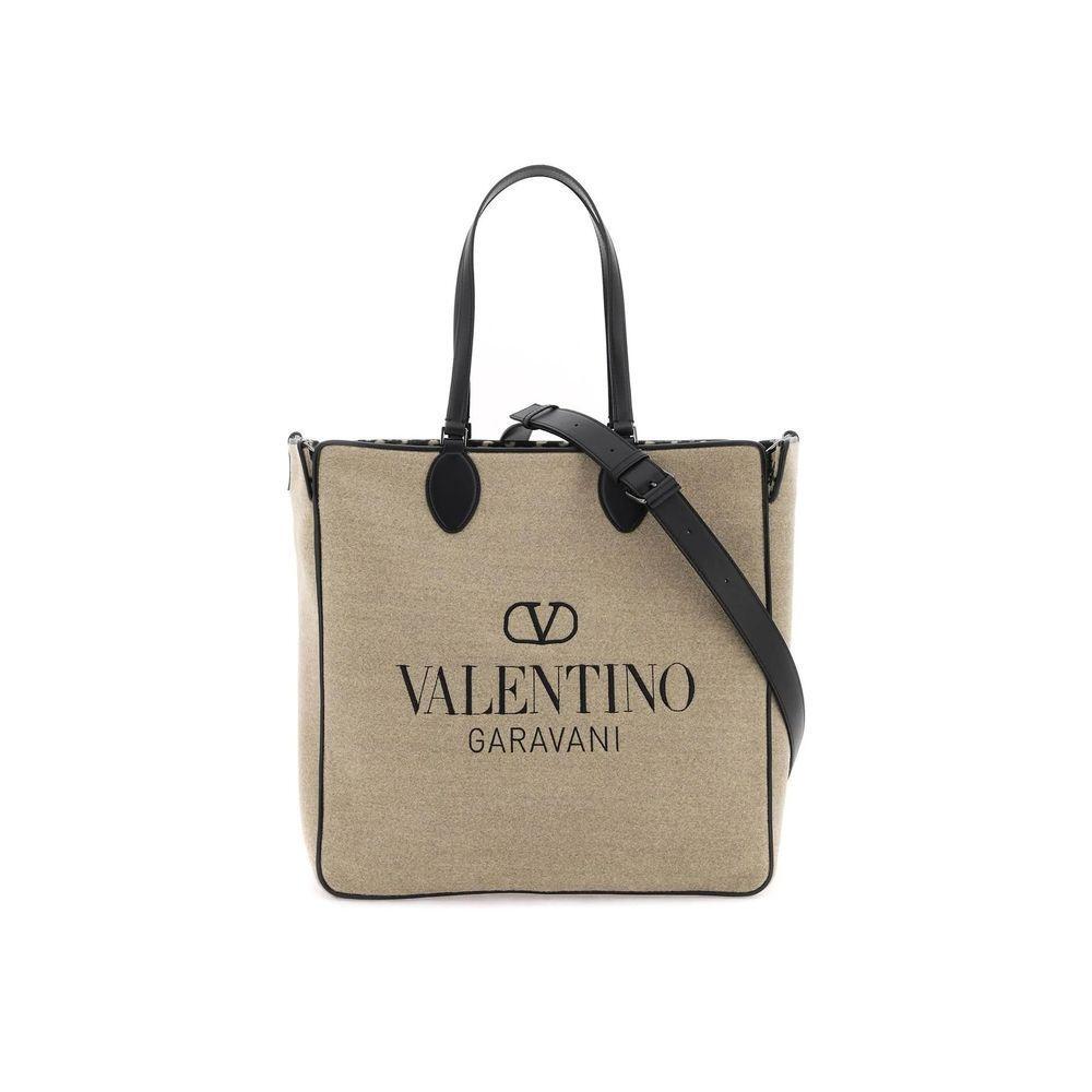 Front view with bag zipped and handles upright.