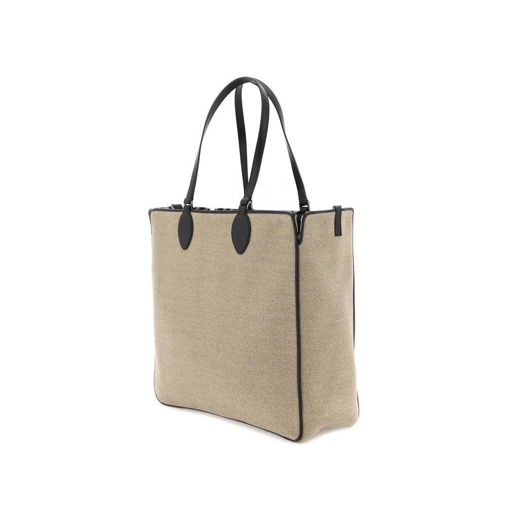 Front view with bag zipped and handles upright.