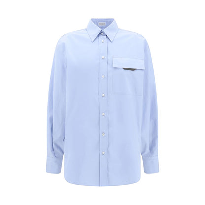 Brunello Cucinelli Light Blue Cotton Dress Shirt with classic collar, button closure, and jeweled pocket for understated luxury.