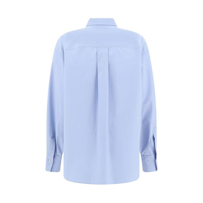 Brunello Cucinelli Light Blue Cotton Dress Shirt back view showcasing classic design and adjustable cuffs.