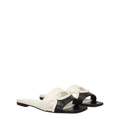 Valentino Garavani Black Leather Slippers with ivory accents, casual open toe, and low flat heel, MPN S0GH7ZUC790, product code F78162.