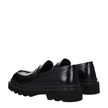 Dolce & Gabbana Black Leather Slip-On Loafers with rubber sole and square toe, side view