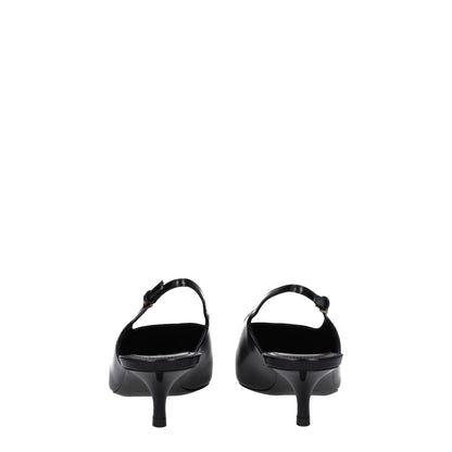 Rear view of Givenchy Black Leather Mid Heel Pumps with buckle closure and pointy toe, featuring 5.5 cm mid heels.
