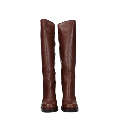 Prada Brown Leather High Heel Boots with round toe and 9 cm heel, featuring leather sole and cognac secondary color.