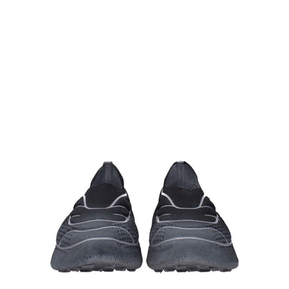 Front view of Givenchy Gray Fabric Athletic Sneakers with round toe, featuring side logo and a rubber sole for casual wear.