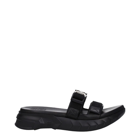 Givenchy Black Fabric Slippers with silver clip closure, rubber sole, and open toe design; mid-heel slippers showcasing front logo.