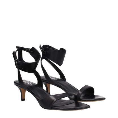 Isabel Marant Black Leather Sandals with buckle closure and mid heels.