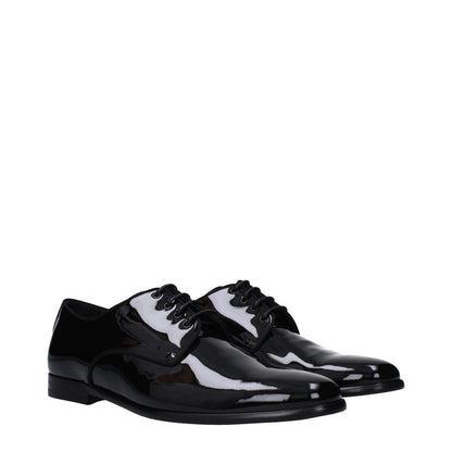 Dolce & Gabbana Black Leather Oxfords And Derbies with lace-up design and low heel.