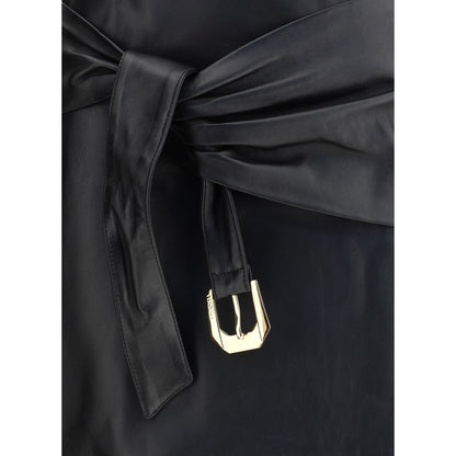 Close-up of Versace Black Lamb Ovis Aries Aries Mini Skirt with decorative knot detail and gold-tone buckle.