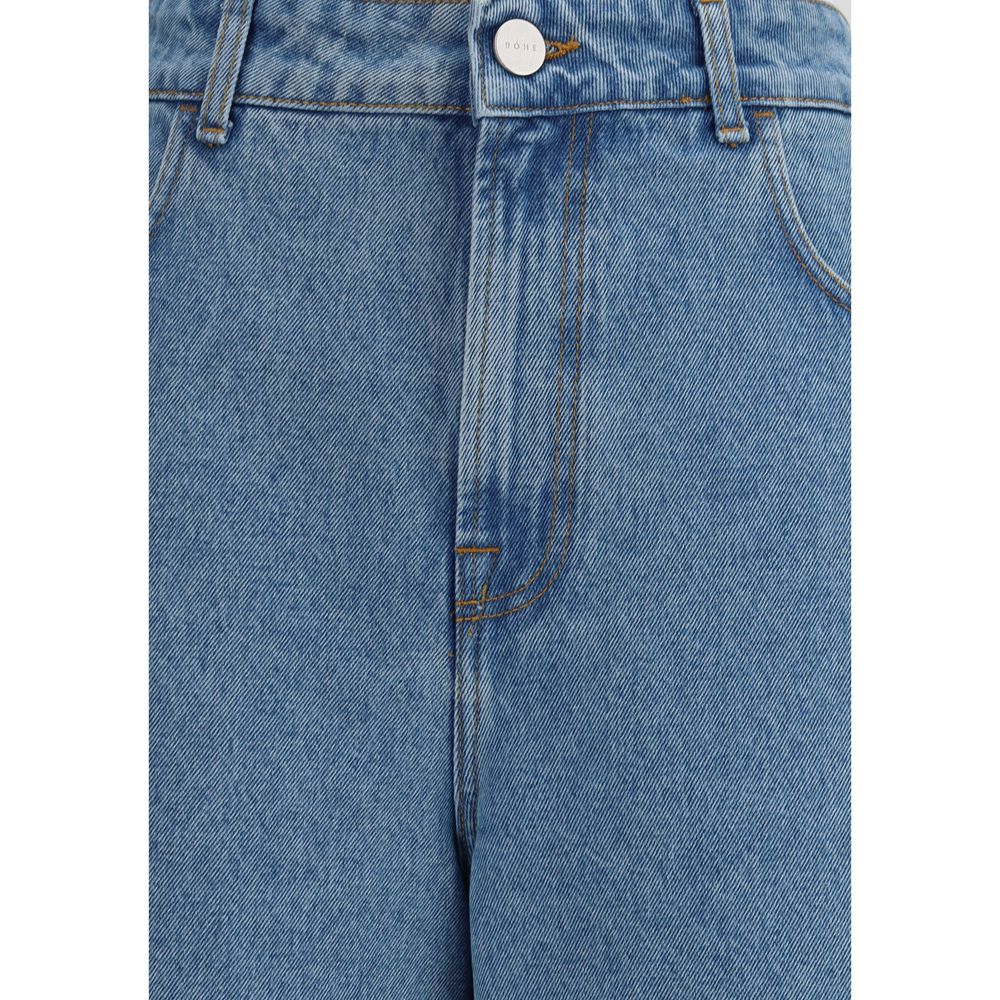 Close-up of Rohe Blue Cotton Relaxed Fit Jeans showing front zip and button closure with belt loops.