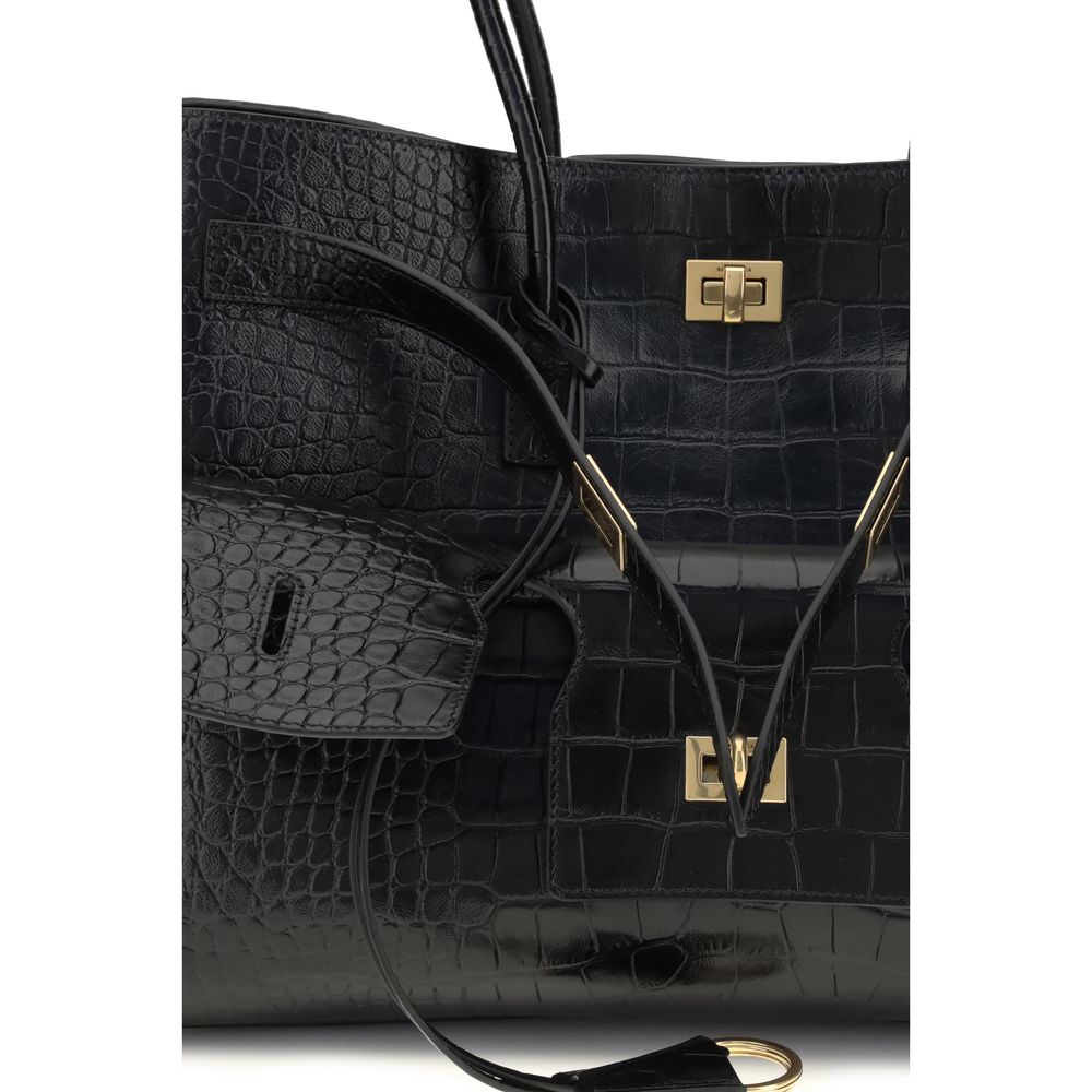Close-up of Balenciaga Black Calf Leather Bos Taurus Shoulder Bag with gold hardware and crocodile-effect design.