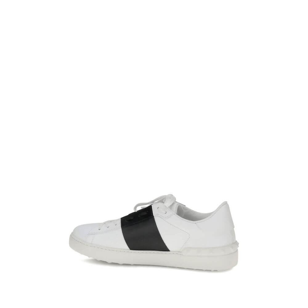 Valentino Garavani White Calf Leather Bos Taurus Low Top Sneakers with contrasting black band and flat sole for versatile wear.