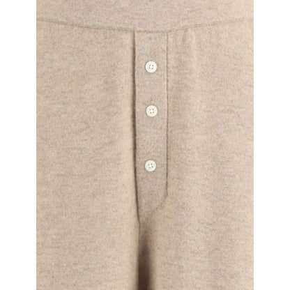 Guest in Residence Beige Cashmere Casual Pants with front buttons showcasing luxury and style.