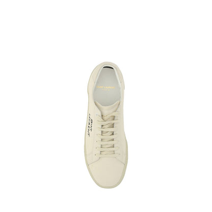 Alt Tag: Top view of Saint Laurent White Rubber Low Top Sneakers with lace-up front and crater-effect sole.