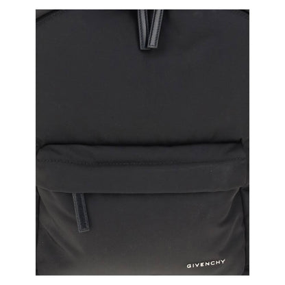 Givenchy Black Polyamide Backpack with front zip pocket and metal signature logo on the front for a modern, stylish look.