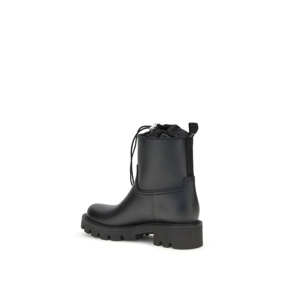 Moncler Black Rubber Lace-Up Boots with tonal logo and drawstring closure for an adjustable fit, side view of the boot on white background.