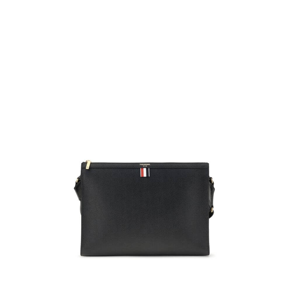 Thom Browne Black Calf Leather Bos Taurus Clutch Bag with tricolor detail and adjustable strap, made in Italy, AW25 collection.