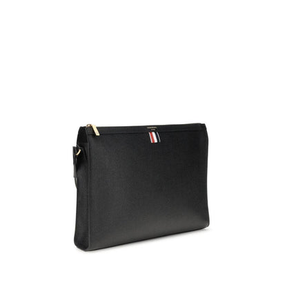 Thom Browne Black Calf Leather Bos Taurus Clutch Bag with iconic tricolor detail and top zipper closure, made in Italy, AW25.