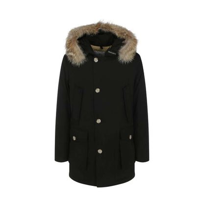 Woolrich Black Cotton Parka with fur hood, invisible zip, cista buttons, and oversized fit, perfect for winter fashion.