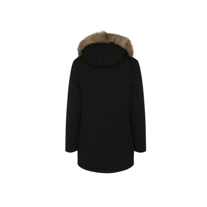 Rear view of Woolrich Black Cotton Parka with fur-trimmed hood and padded design for AW25 season.