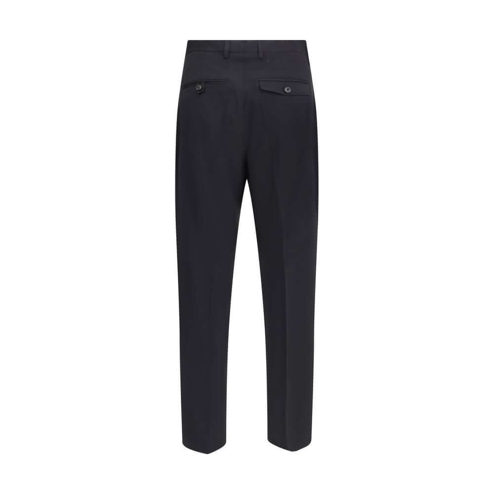 Alt Tag: Back view of Our Legacy Black Fleece Wool Chino Pants with straight leg and button closure, made in Portugal.