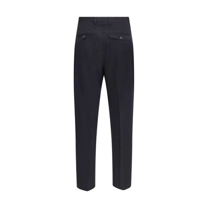 Alt Tag: Back view of Our Legacy Black Fleece Wool Chino Pants with straight leg and button closure, made in Portugal.