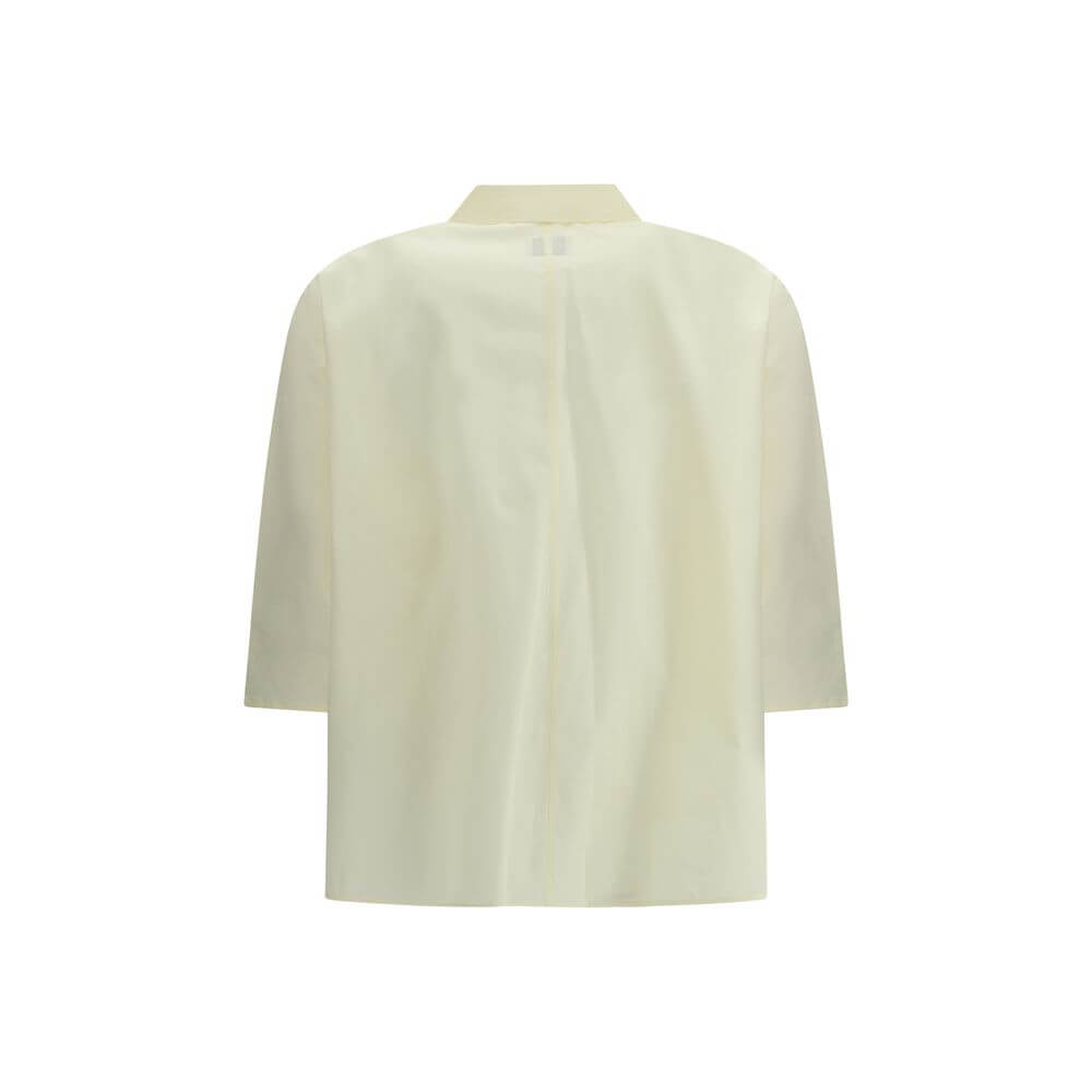 Back view of Cruna Yellow Cotton Blouse with 3/4 sleeves and classic collar, elegant for casual or formal occasions.