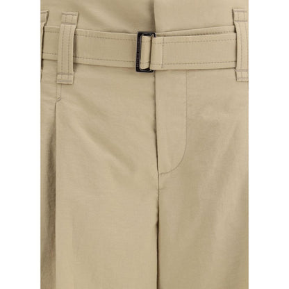 Close-up of Brunello Cucinelli Beige Cotton Cropped Pants showcasing pleated design and draw belt detail.