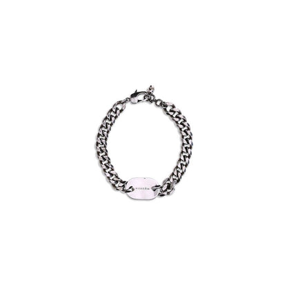 Alexander McQueen Silver Brass Bracelet with chain and engraved skull tag on white background