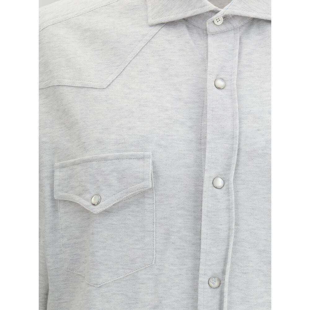 Brunello Cucinelli Gray Cotton Shirt with snap button closure, classic collar, and patch pockets. Elegant grey melange knit, 100% cotton.