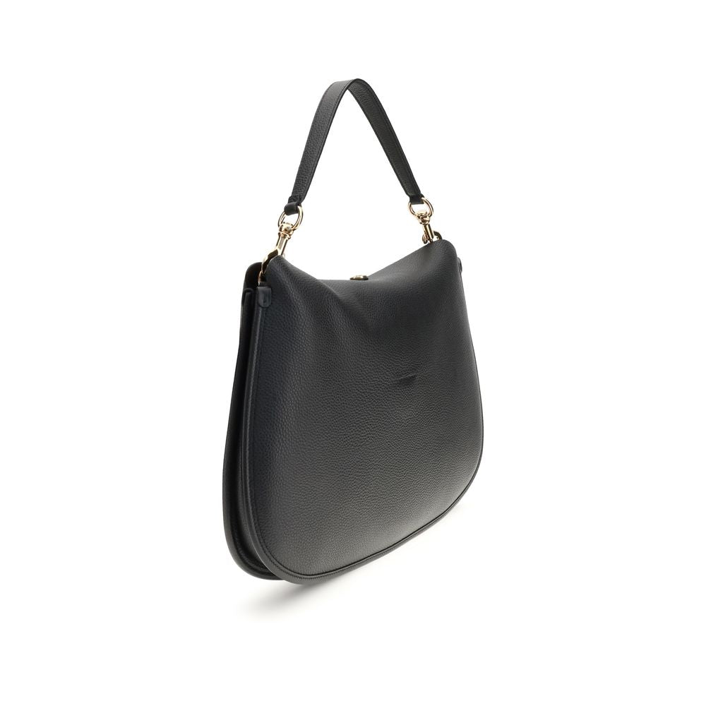 Front view with bag zipped and handles upright.