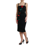 Dolce & Gabbana Black Wool Sleeveless Rose Applique Dress with red rose embroidery, elegant sheath midi design for formal occasions.