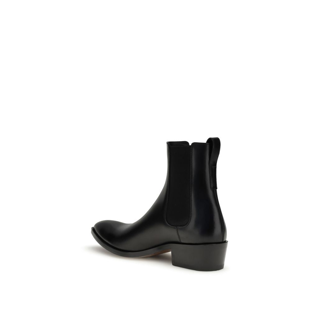 Side view of Tom Ford Black Calf Leather Bos Taurus Chelsea Boots with ankle-length design and solid block heel for men.