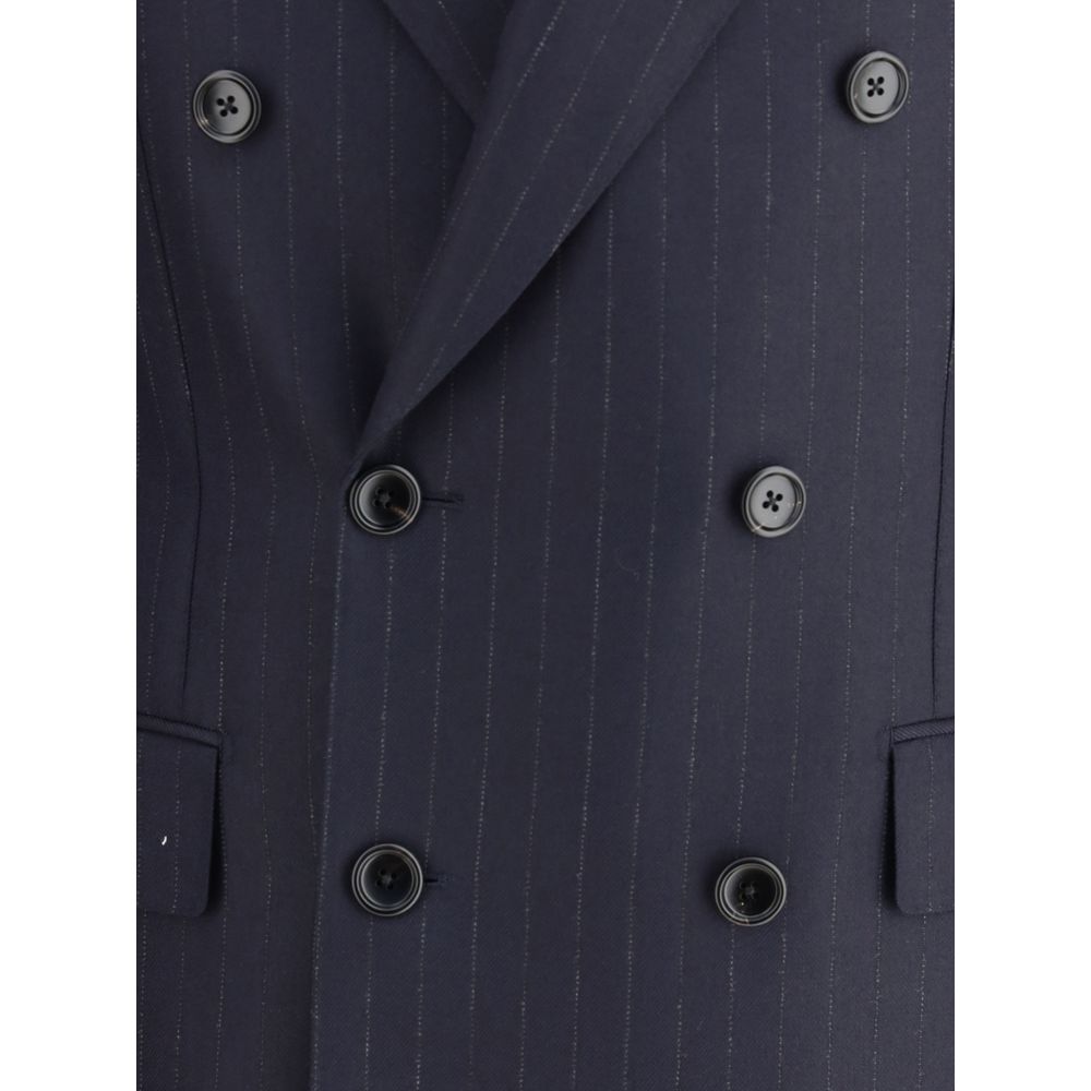 Close-up of Tom Ford Blue Wool Blazer showcasing double-breasted button pattern and pinstripe design with elegant peaked lapels.