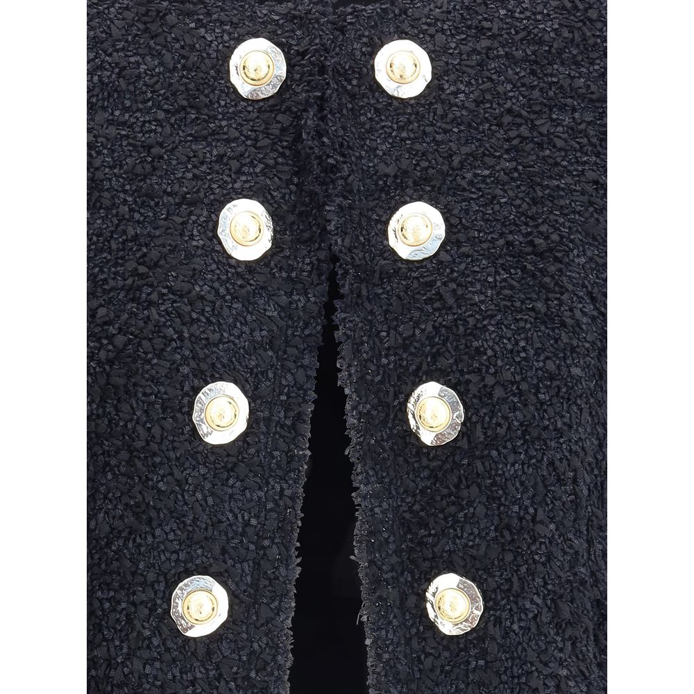 Close-up of Balmain Black Polyamide Coat with gold coin buttons, showcasing luxury and elegance.