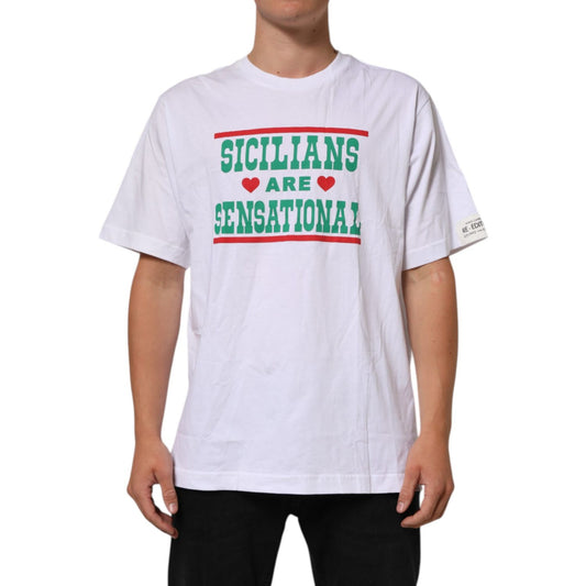 Dolce & Gabbana White Graphic Print Cotton Crew Neck T-shirt with text 'Sicilians are Sensational', short sleeves, worn by model.