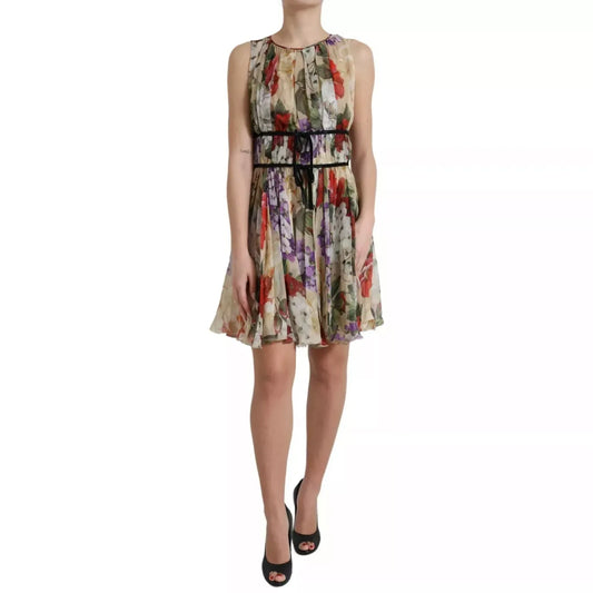Dolce & Gabbana Beige Floral Sleeveless A-line Mini Dress in lightweight silk with delicate floral print for elegant daytime or special occasions.