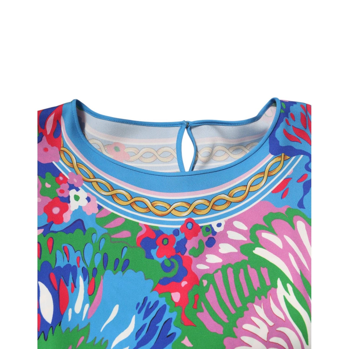 Dolce & Gabbana Multicolor Floral Printed Tunic Blouse Top close-up showcasing vibrant floral design in blue, pink, and green hues.