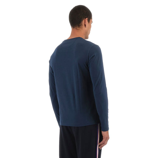 Back view of a model wearing a La Martina Blue Cotton T-Shirt with long sleeves and logo embroidery on the chest