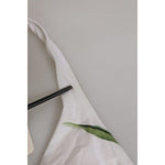 Close-up of Dolce & Gabbana White Floral Swimsuit 2 Piece Top Bottom Swimwear showing strap and floral pattern detail.