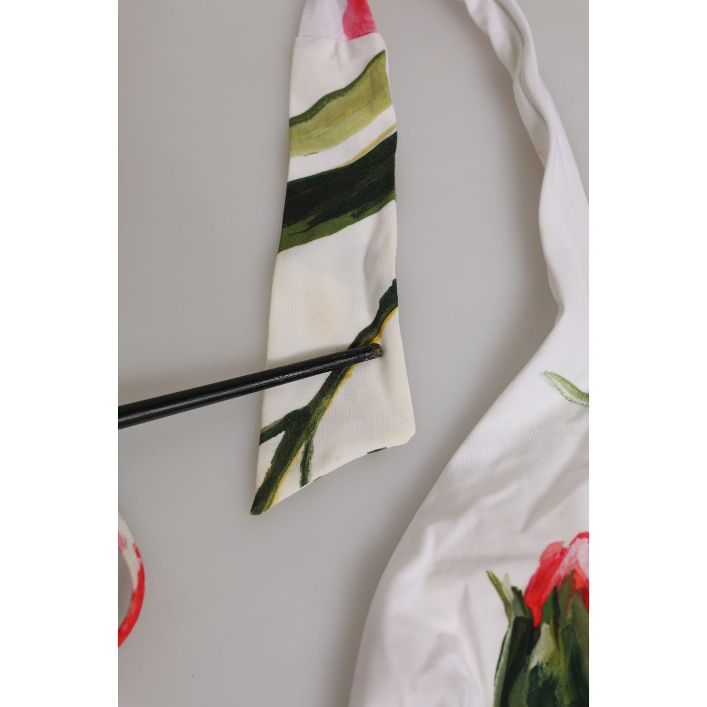 Dolce & Gabbana White Floral Swimsuit 2 Piece Top Bottom Swimwear showing vibrant floral detail and quality craftsmanship.