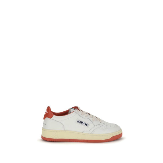 Autry White Leather Athletic Sneakers with red heel and blue logo, reinterpreted with a modern design by Maison Kitsuné, side view.