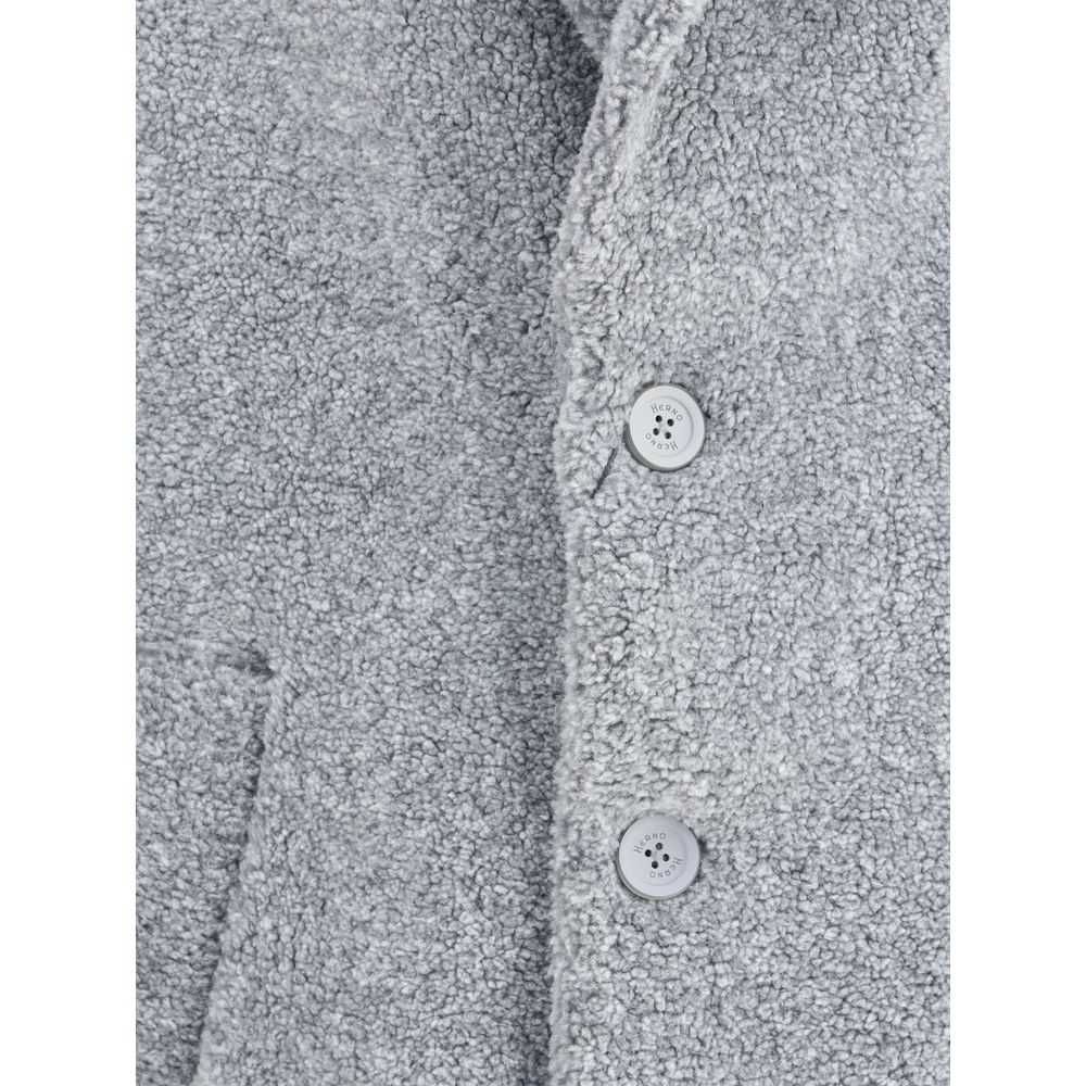 Close-up of Herno Gray Polyester Coat with button details and soft texture, showcasing elegance and sophistication for AW25.