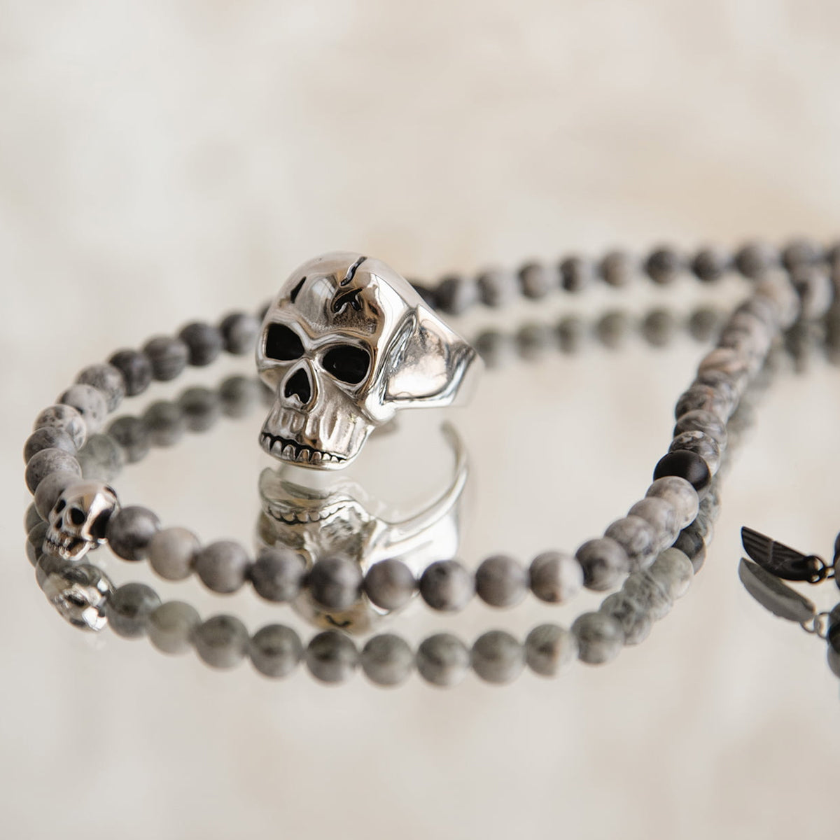 AN JEWELS JEWELRY Mod. AA.R255S-12 skull ring and bracelet set in silver and gray beads