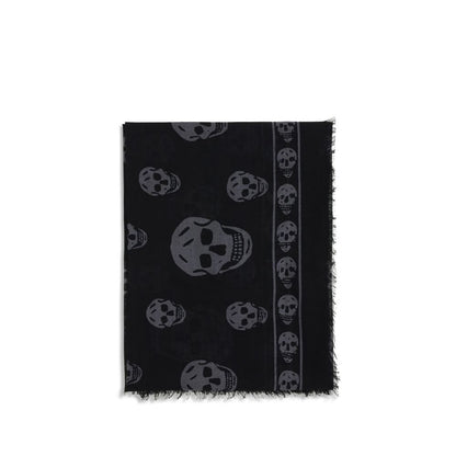 Alexander McQueen Black Modal Scarf with skull motif and fringed edges, made of silk and modal blend in black and dark grey.