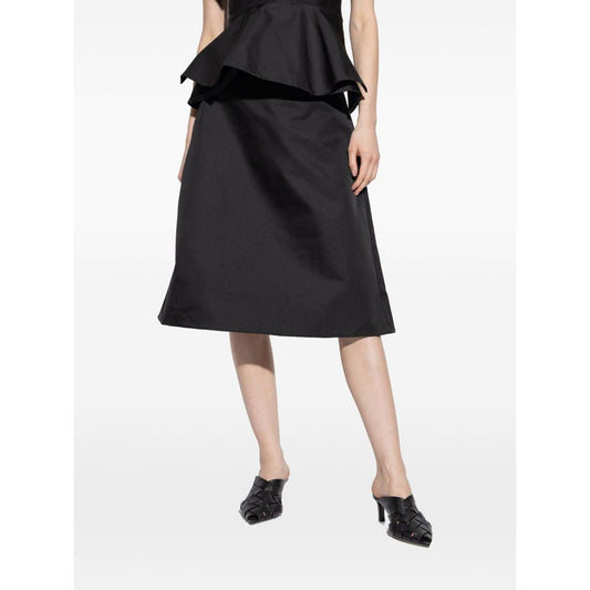 Model wearing Alexander McQueen Skirts Black, black satin finish A-line silk skirt, showcasing elegant fashion style.