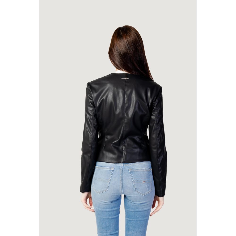 Back view of Armani Exchange Black Leather Jacket on model showcasing its fitted cut and leather-effect texture.