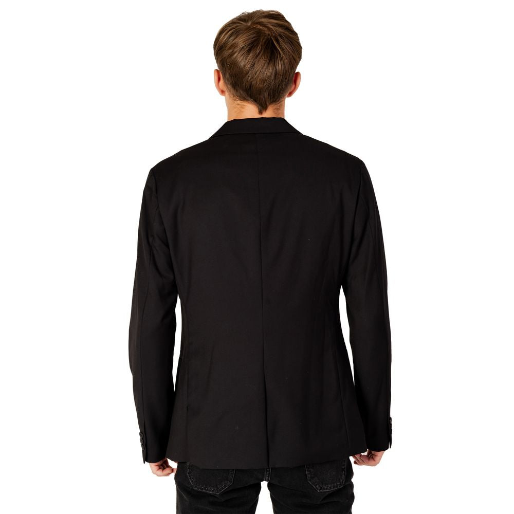 Back view of Armani Exchange Black Polyester Blazer worn by a man, showcasing its modern design and perfect fit.